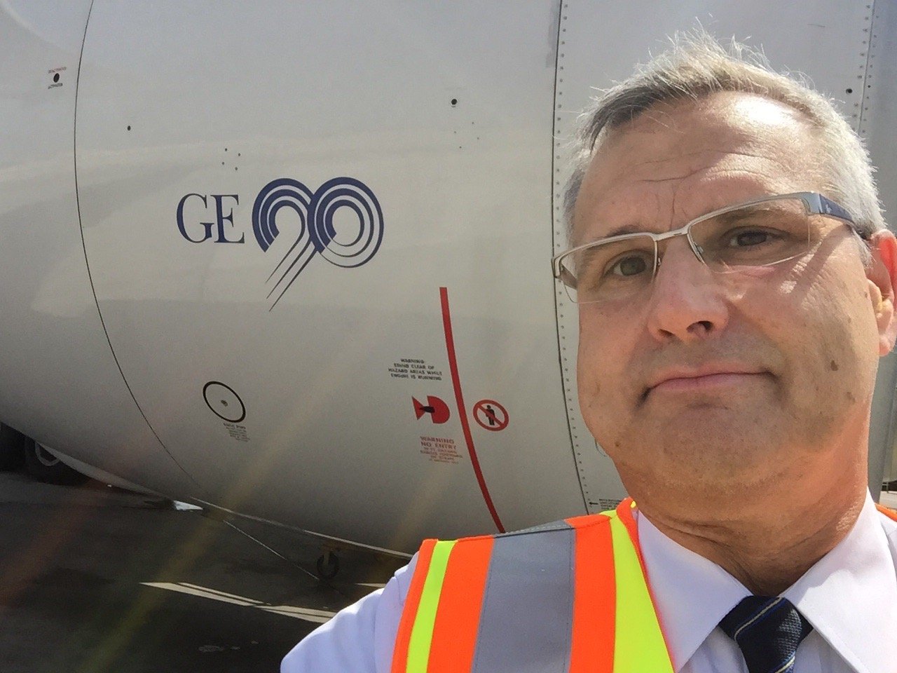 IAS inspector examining a GE90 engine on a Boeing 777